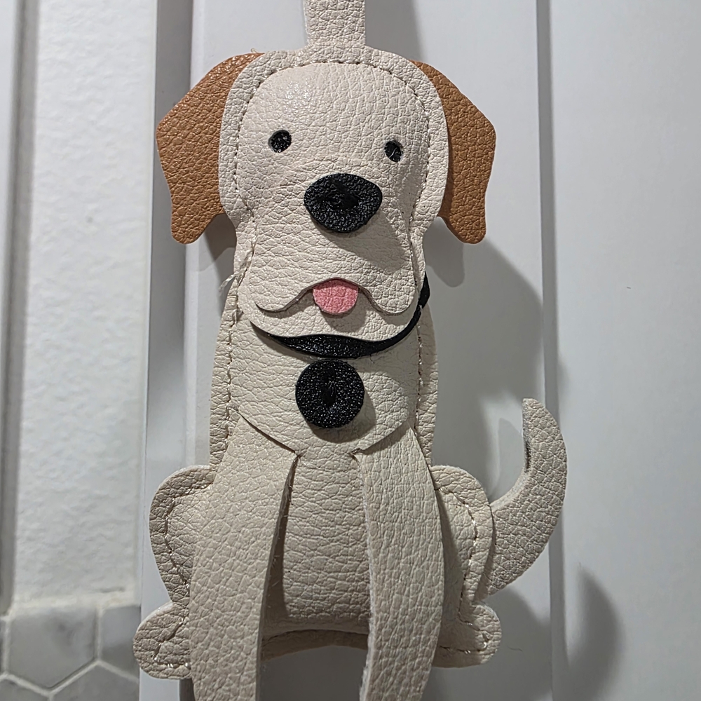 Charming Cream and Tan Dog Keychain by Source Unknown